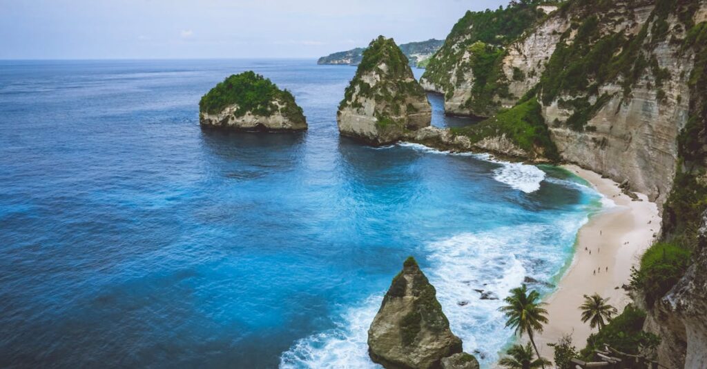 Breathtaking view of Diamond Beach with rocky formations and turquoise waters in Bali, Indonesia.
